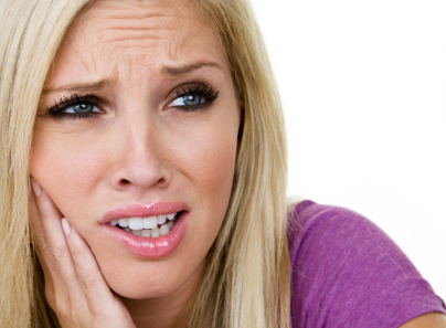 woman teeth loose pain